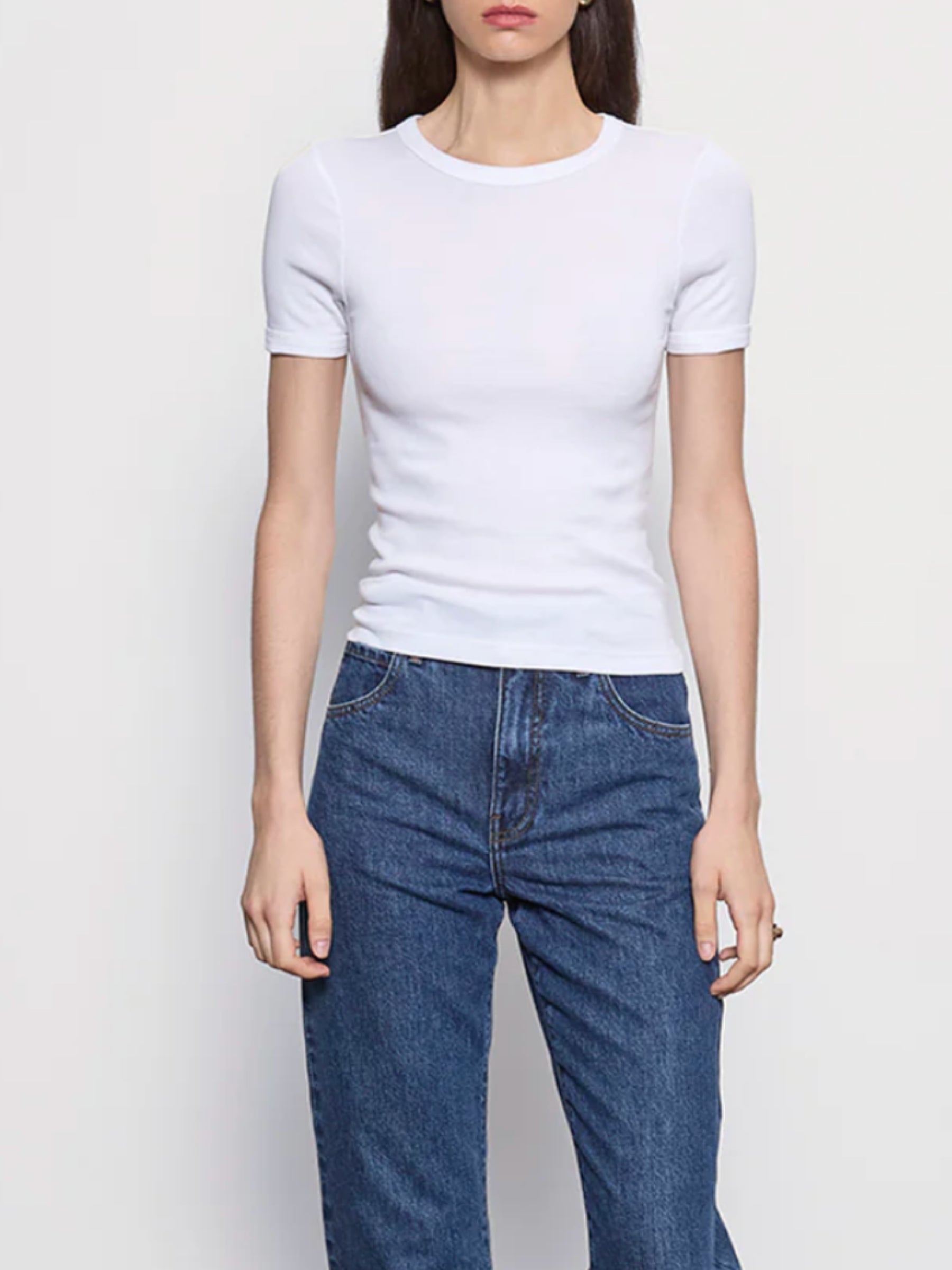 Enza Costa Supima Cotton Perfect Tee in white on model with jeans, front view