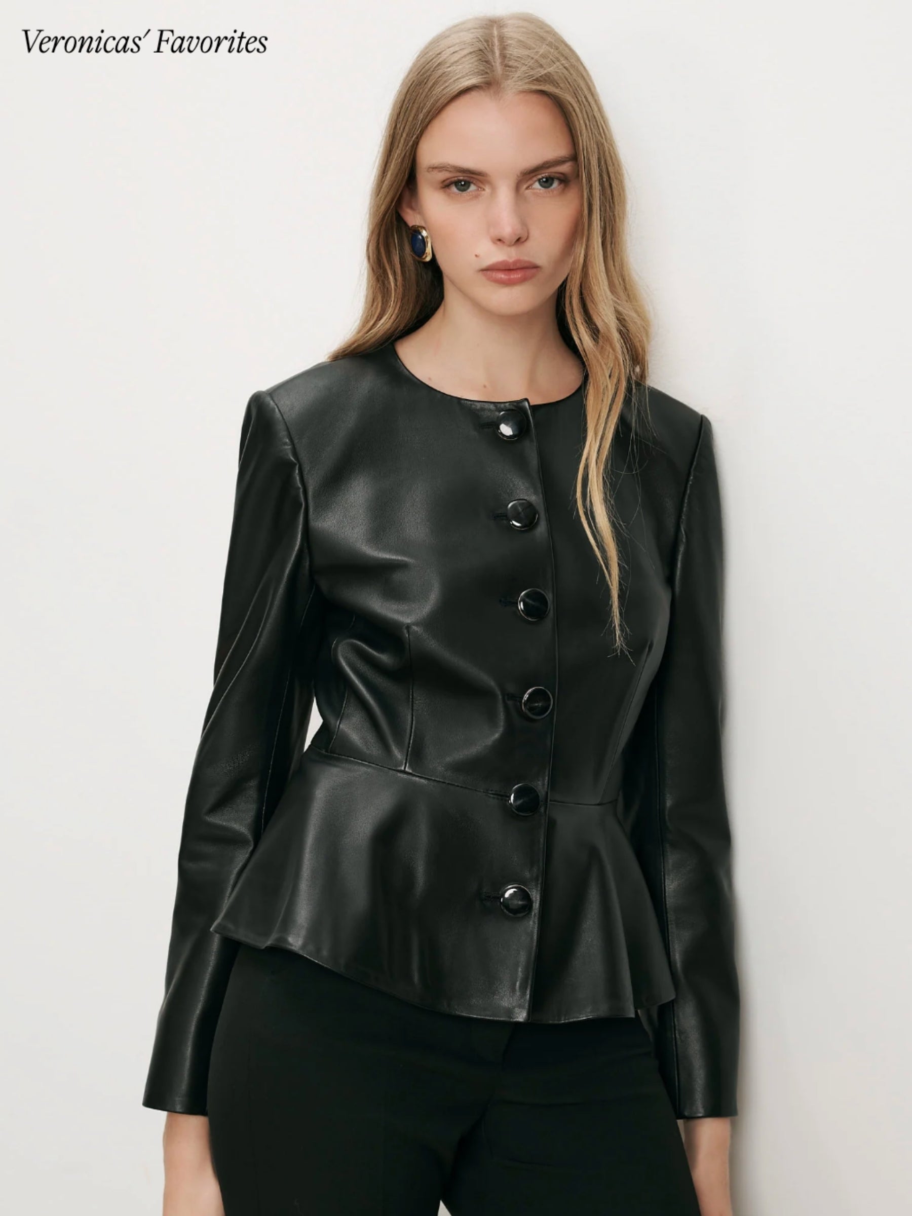 Model wearing the Veronica Beard Quinn Leather Peplum Jacket in Black, front view
