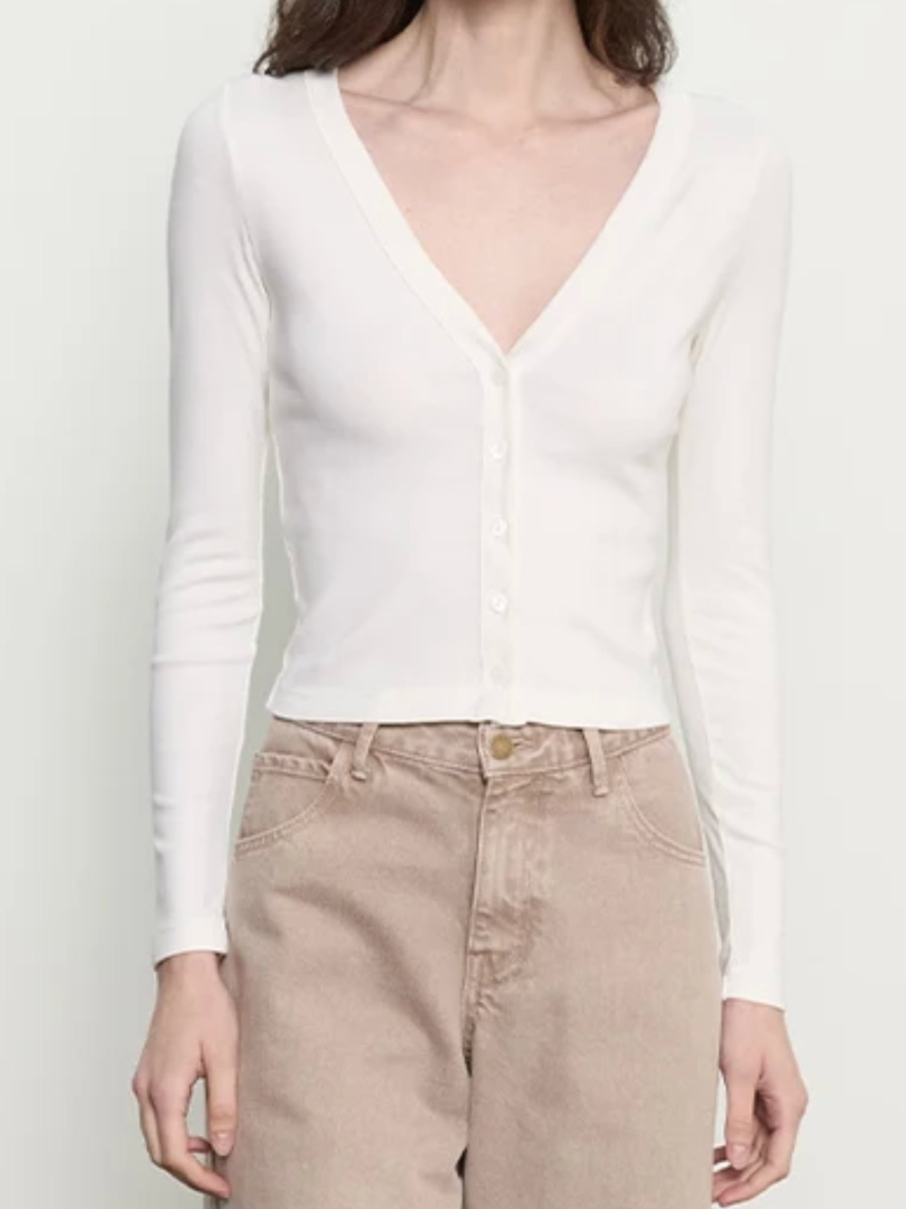 Enza Costa Supima Cotton V-Neck Cardigan in white on model, waist-up front view