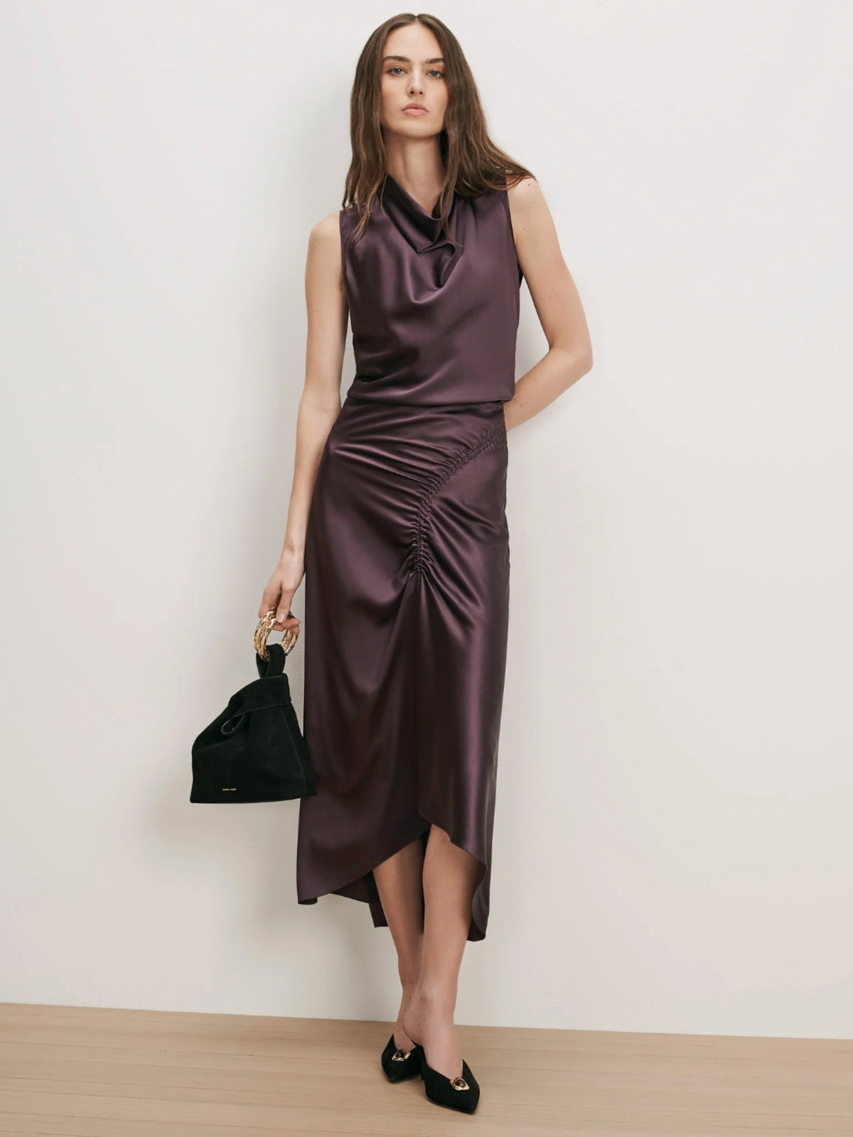 Veronica Beard Tam Dark Eggplant blouse styled with a matching ruched midi skirt