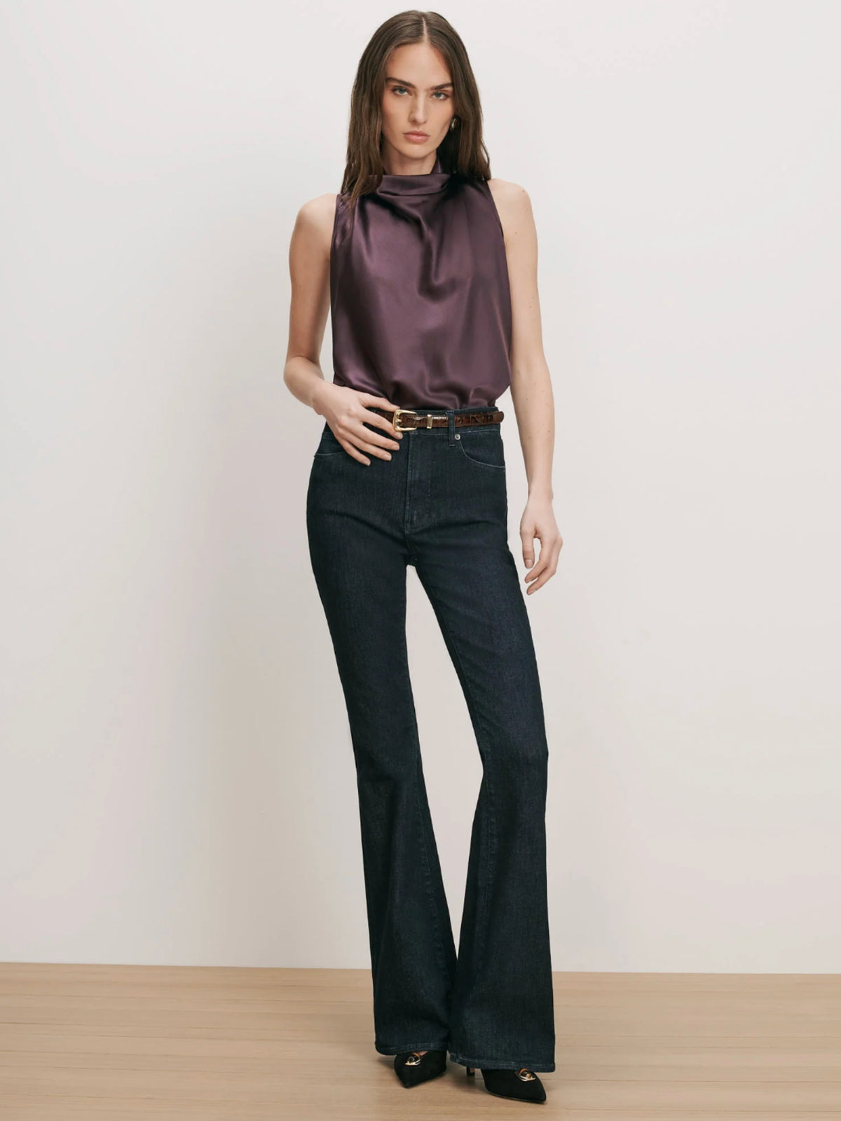 Veronica Beard Tam Dark Eggplant blouse tucked into jeans, full-length front view