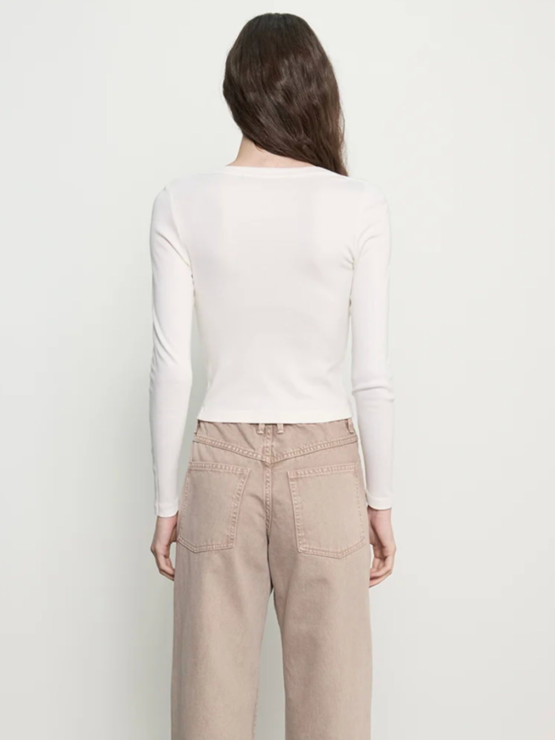Enza Costa Supima Cotton V-Neck Cardigan in white on model, back view
