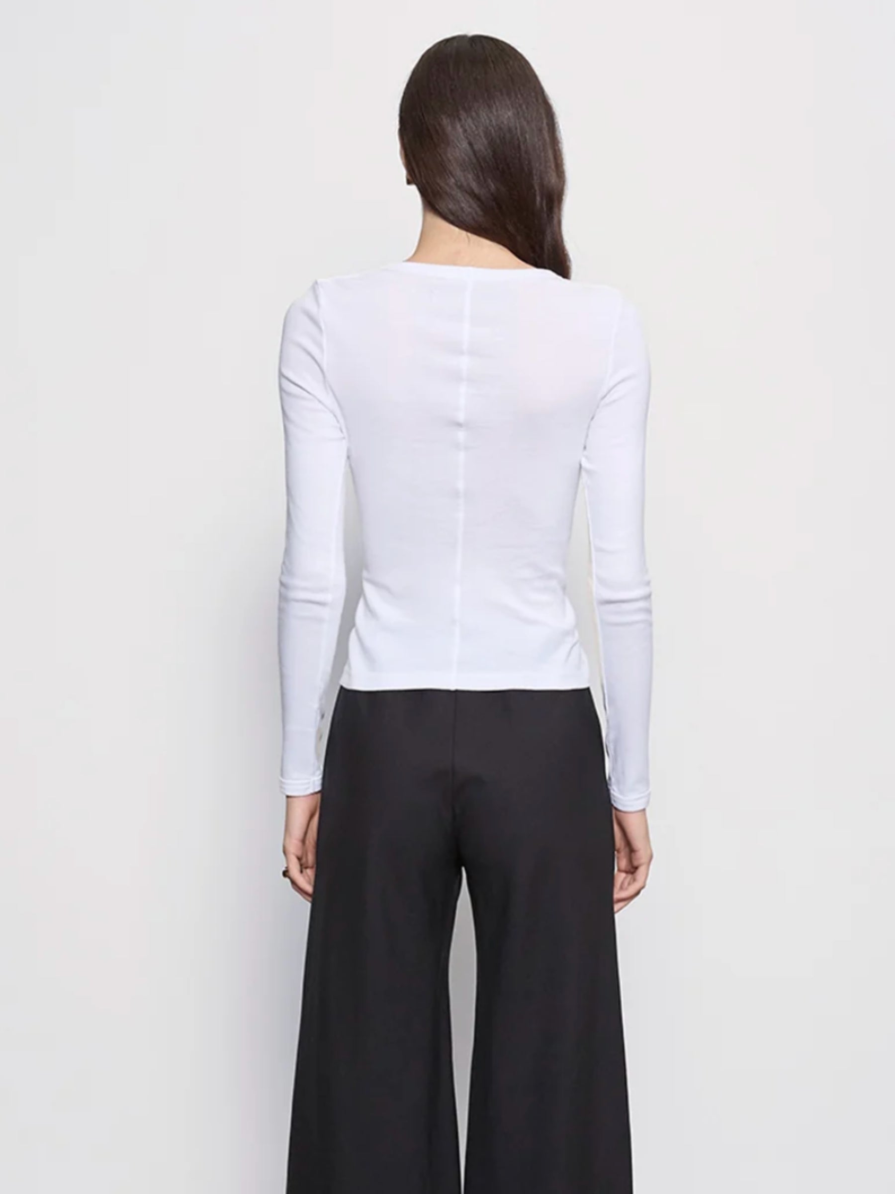 Enza Costa Supima Cotton New Classic Long-Sleeve Tee in white on model, back view