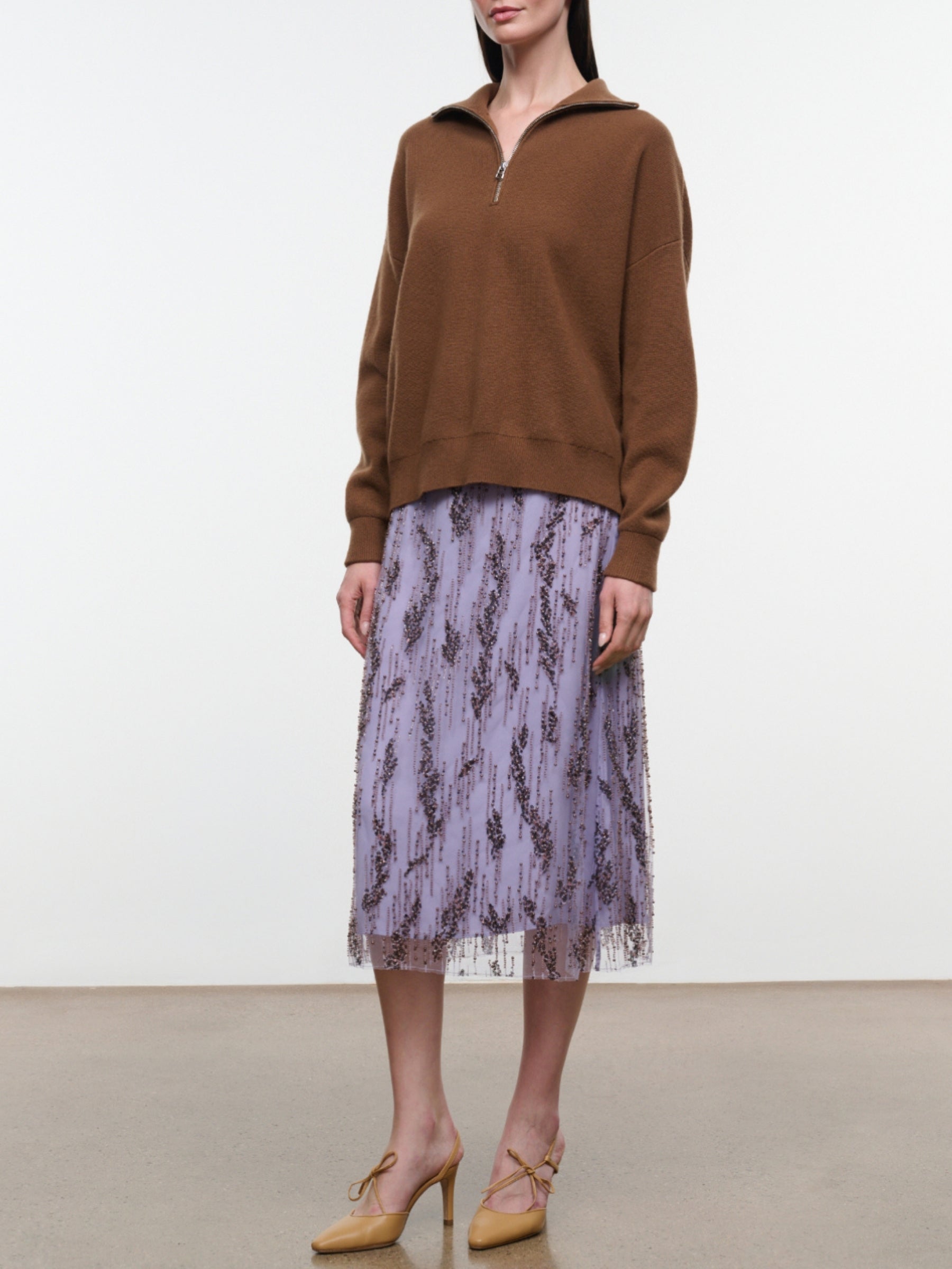 Model wearing the Staud Aviva Skirt in Lilac, full-length front view