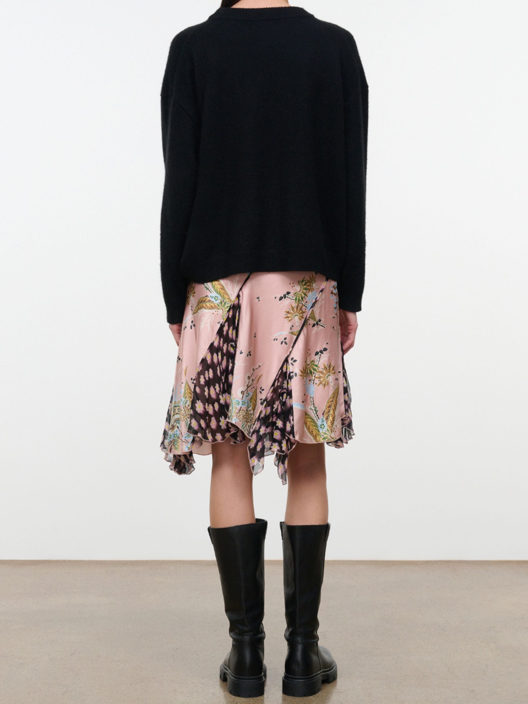 Full-length back view of model wearing Staud Reannah Silk Skirt in Tapestry Rose Multi